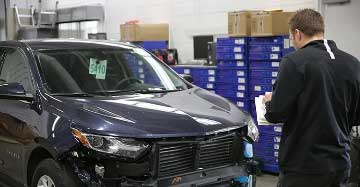 Customer Vehicle going through the estimation process at dealer shop