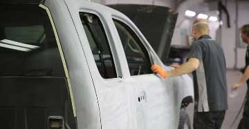 Painting process at dealer shop